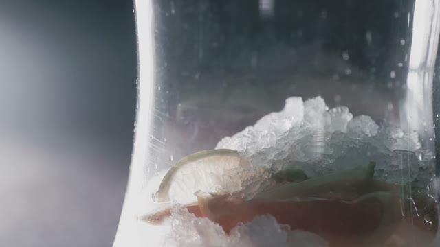 Flask Contains Pieces Of Fruit