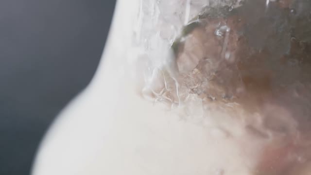 In A Flask With Ice Poured Water