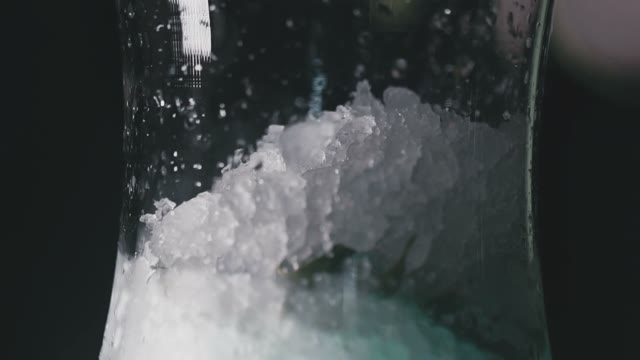 Ice Is Poured Into A Shisha Flask