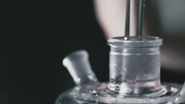 Hookah Server Prepares A Hookah
