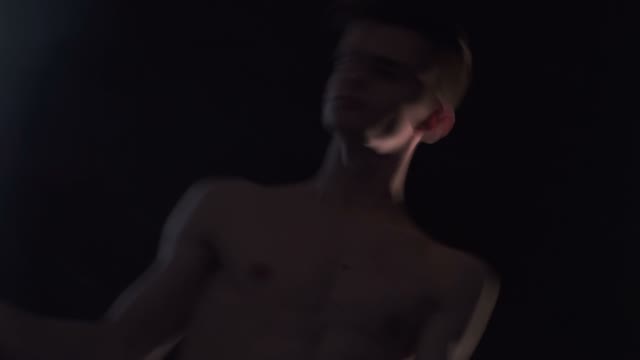 Young Guy Is Spinning On The Spot