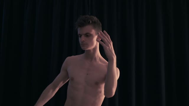 Dancer Performs Movements With His Hands And Head