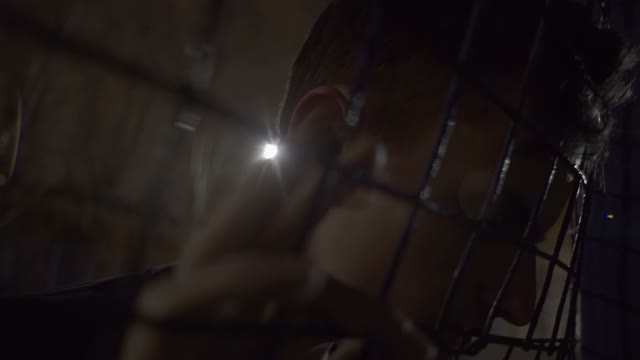 Young Guy Buried His Forehead In The Metal Grate
