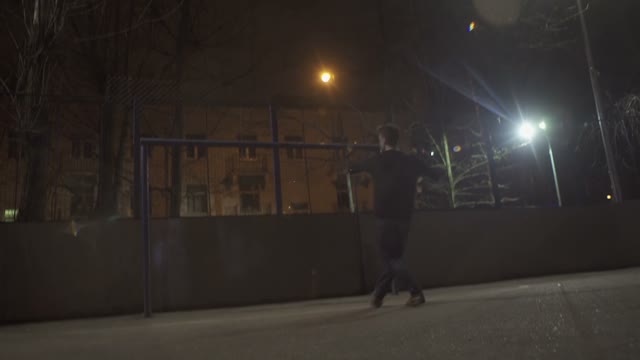 Dancer Man Is Spinning At Night On The Street