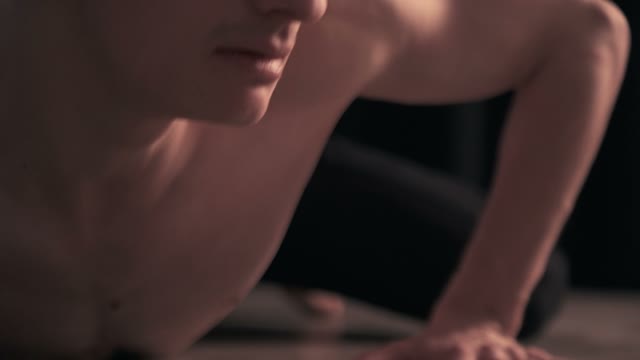 Dancer Lies Down On The Floor And Moves