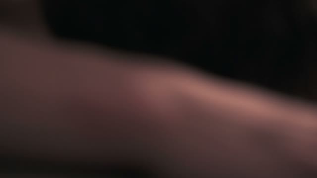 Dancer Lies On His Stomach And Turns Over On His Back