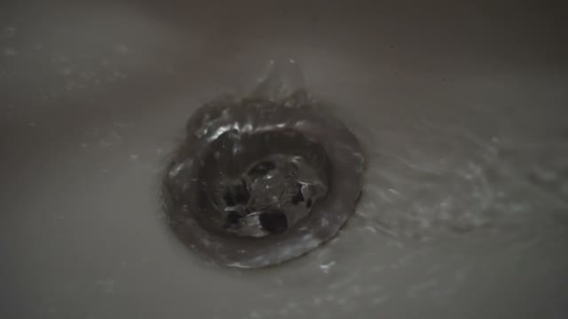 Water Splashes In The Sink
