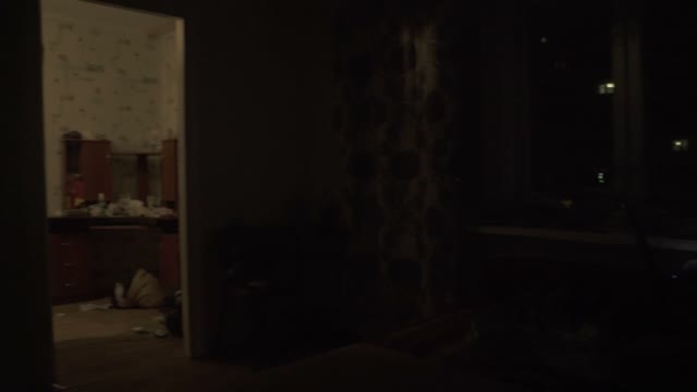 Man Sitting On Laptop On Bed