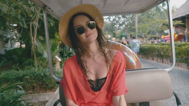 Girl In Glasses Sits On The Seat In The Car
