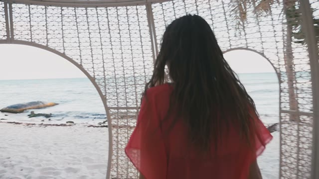 Girl Comes Out Of The Tent To The Seashore