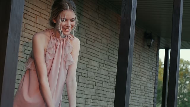 Girl Laughs And Raises Her Head