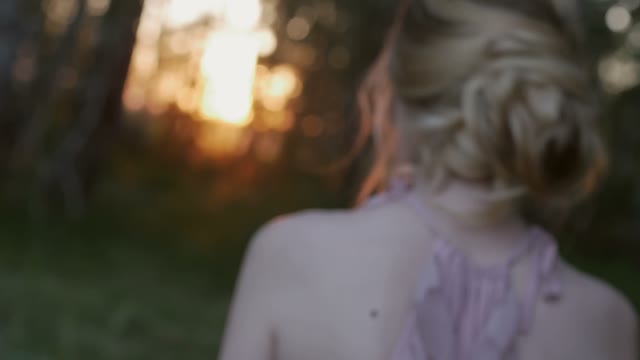 Girl Walks Through The Forest And Turns Around