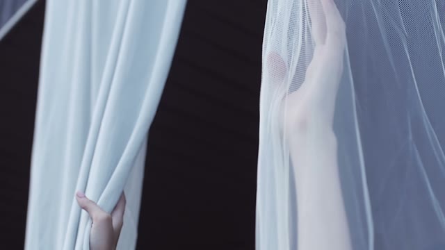 Female Hands Undraw The Curtains
