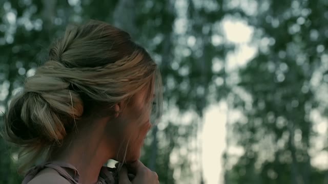 Girl Is Standing In A Green Forest