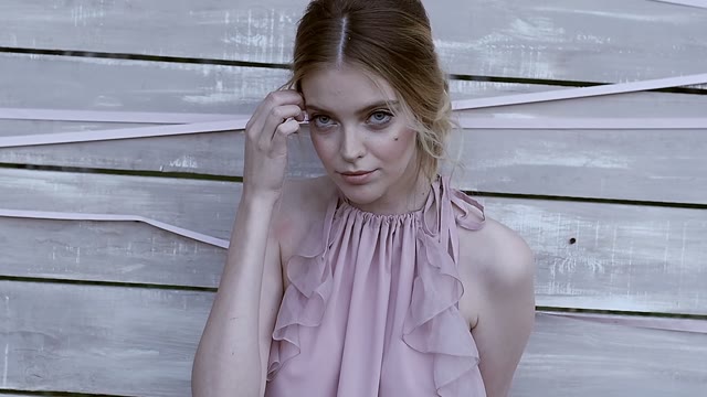 Girl Looking At Camera And Smiling