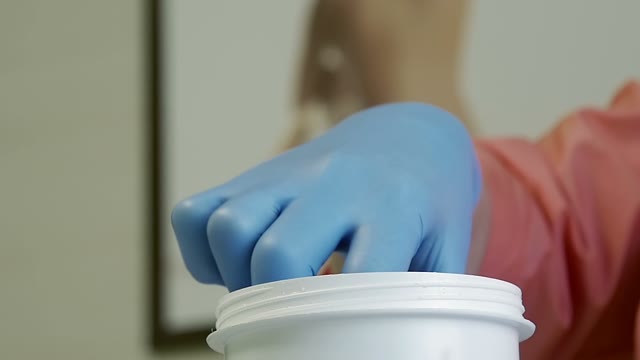 Woman Takes Out A Sugar Paste With Her Hands