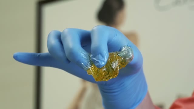 Woman Is Spinning Sugar Pasta In Her Hands