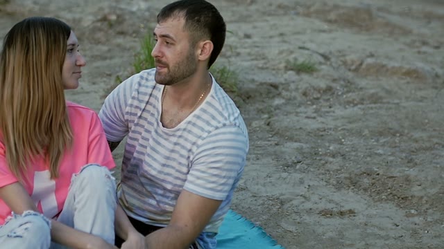 Guy Looks At The Girl And Smiles