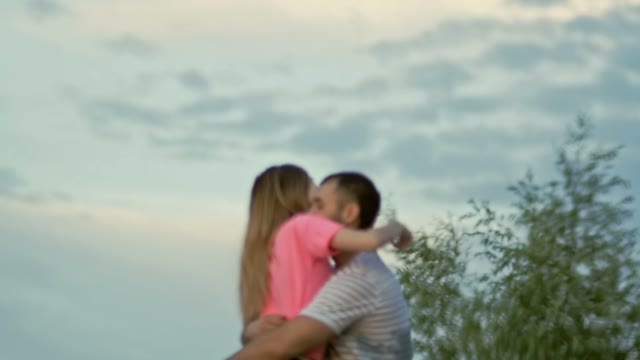 Guy Hugs The Girl And Picks It Up