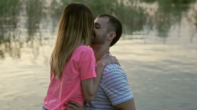 Guy Smiles And Looks At The Girl