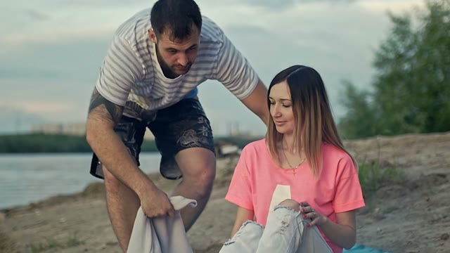Guy Brings A Blanket And Sits Next To The Girl