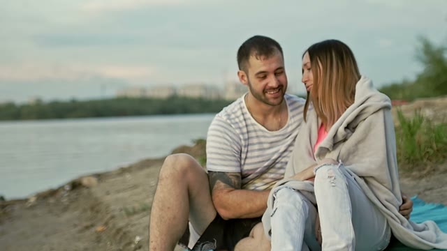 Guy With A Girl Talking And Smiling