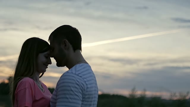 Girl Is Standing With The Guy And Laughing