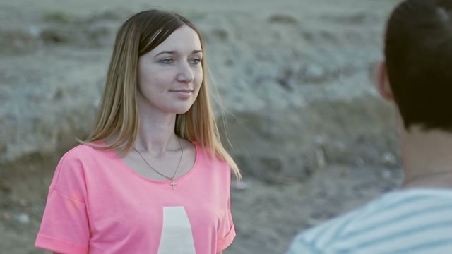 Girl Approaches The Guy And Hugs Him