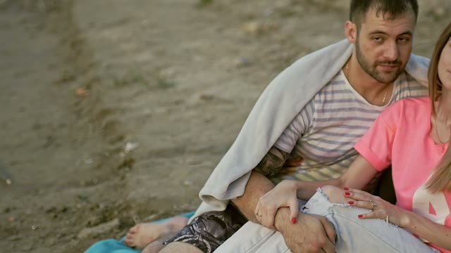Guy With The Girl Sit And Embrace