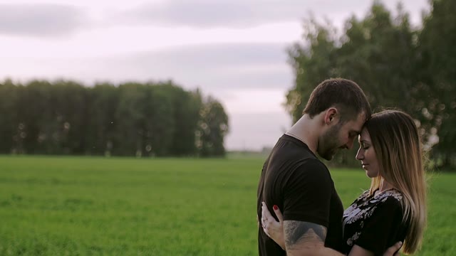 Guy With The Girl Stand Close To Each Other