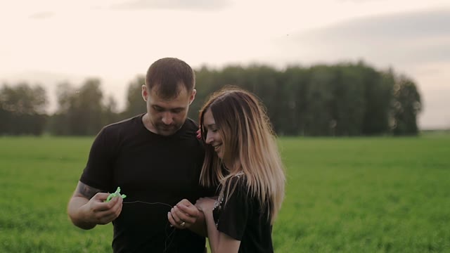 Guy Unravels The Leash From The Kite