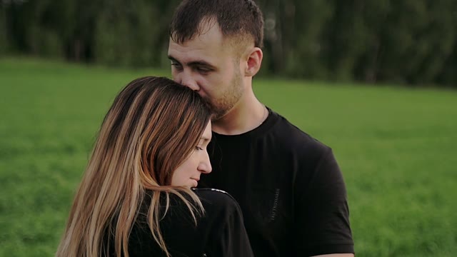 Girl Nestles Her Head Against The Guy