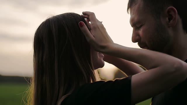 Girl Straightens Her Hair And Looks At The Guy