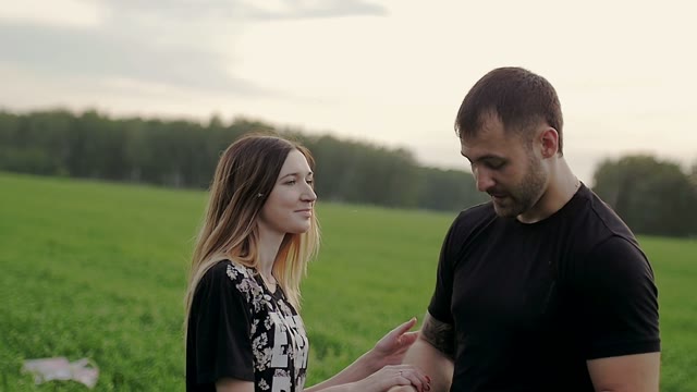 Girl Approaches The Guy And Kisses Him On The Cheek