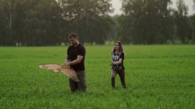 Girl Runs Up To The Guy And Jumps On His Back