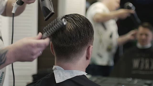 Man Is Combed The Client In A Hairdressers