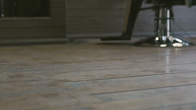Man In Shoes Walks The Wooden Floor