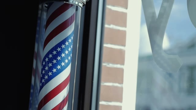 Inside The Building There Is A Stave With The American Flag