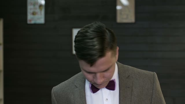 Young Guy Takes A Step And Looks At The Camera