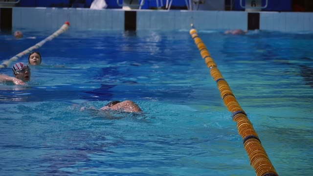Man Is Swimming A Crawl