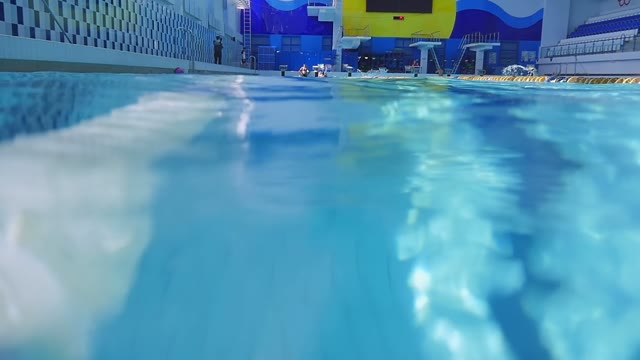 People Are Swimming In The Pool
