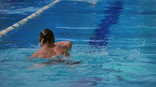 Guy Is Swimming In The Pool