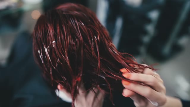 Hairdresser Puts A Mask On His Hair And Puts It By His Hands