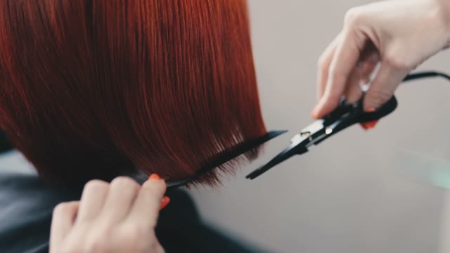 Hairdresser Cuts Off Excess Hair