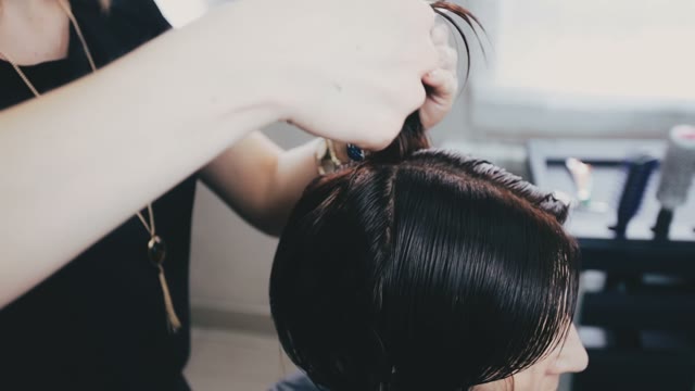Hairdresser Takes Hair And Shears Them