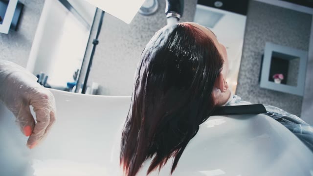 Girl Water Their Hair With Water