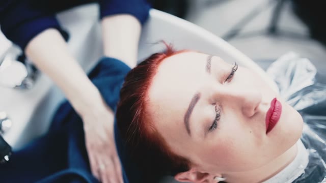 Girl Master Wipes Client Hair With A Towel