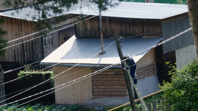 Man Approaches An Electrician