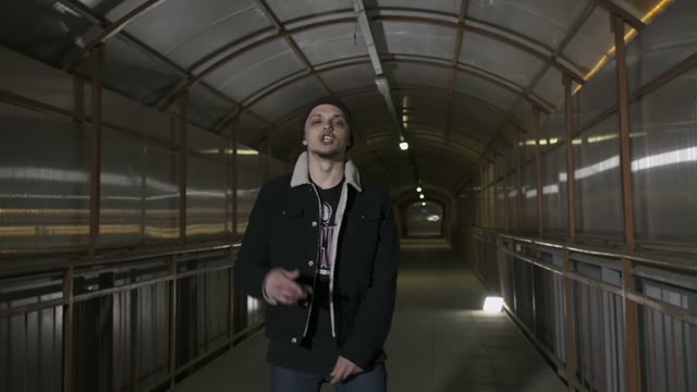 Guy Sings And Gesticulates