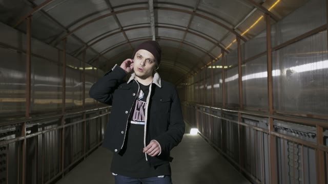 Rapper Straightens Collar